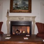 Fireplace in living room in season.